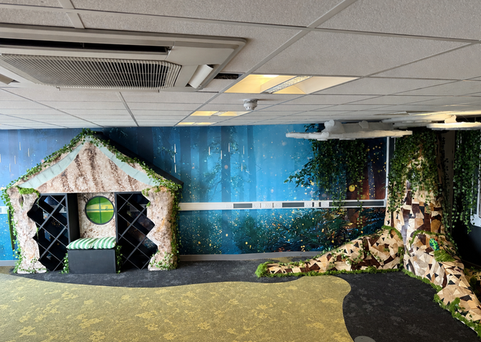 Bespoke educational props including a handcrafted feature tree and themed décor for a Manchester school library.