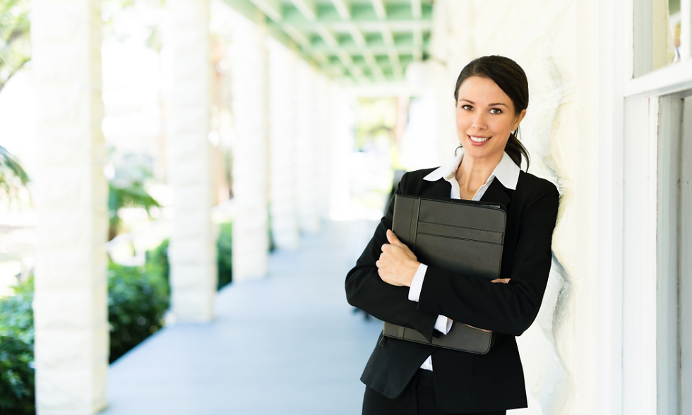 "Confident female real estate investor balancing career and family."