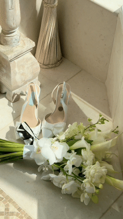 Luxury destination wedding Portugal: bride’s shoes and floral details