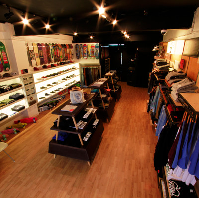 Racks of clothes. Green Apple Skateboard Shop 
by Jon Ferrer.
2015 Grand Jury Prize