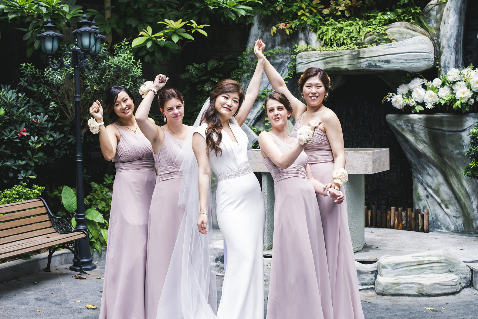 Bridesmaids in custom gowns