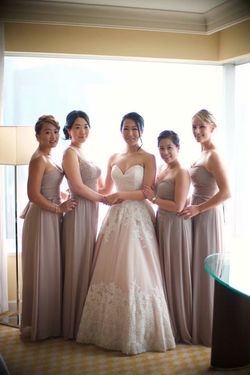 Bridesmaids in custom gowns