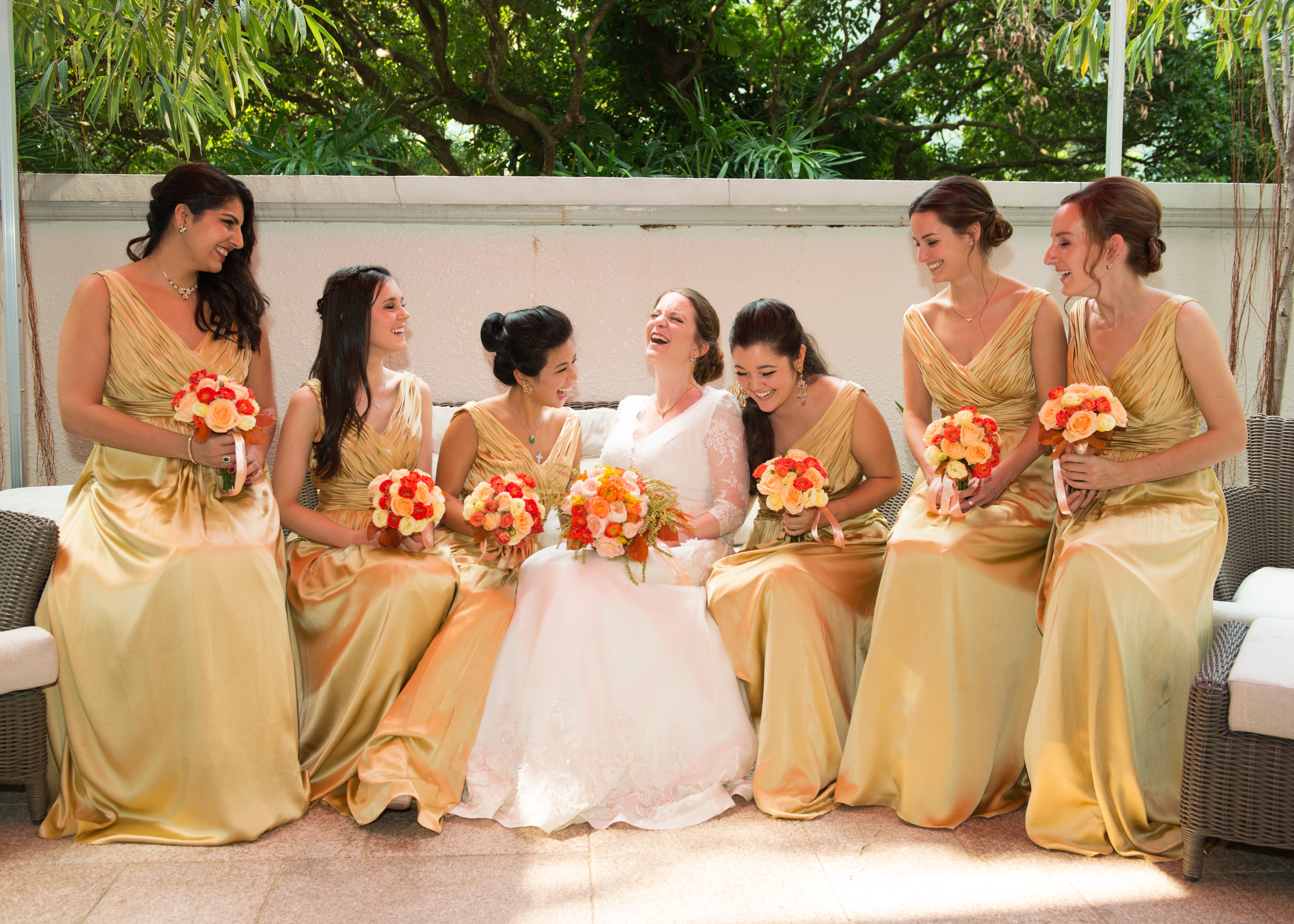 Bridesmaids in custom gowns