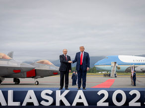 President Donald Trump and Russian President Vladimir Putin shake hands on the tarmac in Anchorage, Alaska, August 2025