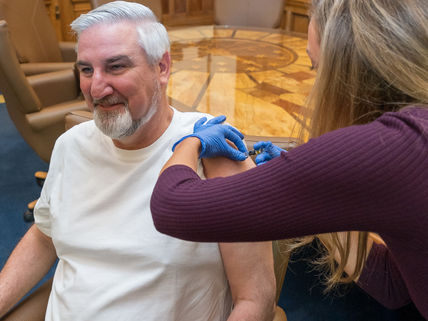 Indiana Governor Eric Holcomb Roasted on Social Media Over COVID-19 Vaccine Post