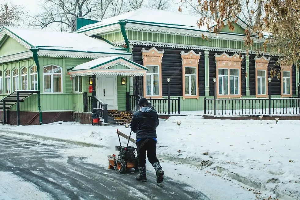 janitor-with-snow-removal-machin.webp