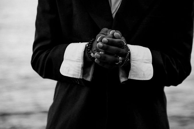 grayscale-shot-of-a-black-man-wearing-a-coat-with-2023-11-27-05-22-17-utc SMALL.jpg