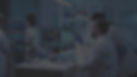 microbiologist-doctor-taking-blood-sample-tube-from-rack-with-machines-analysis-lab-backgr