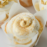 Cupcakes with gold flakes and white frosting, The Love Batch LLC