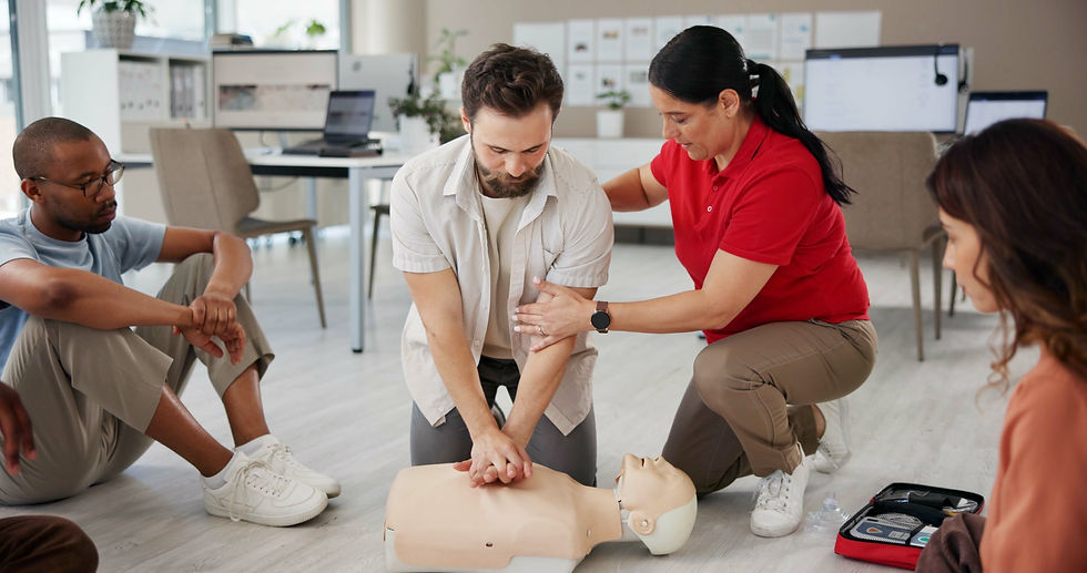 First aid, learning cpr and people with mannequin for safety compliance, health or chest c