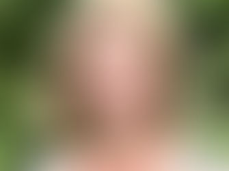 Children’s book author Carolyn Watkins in her garden, sharing her passion for writing stories that support children’s emotional growth and confidence.