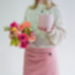 Thumbnail: person with pink and orange mixed bouquet