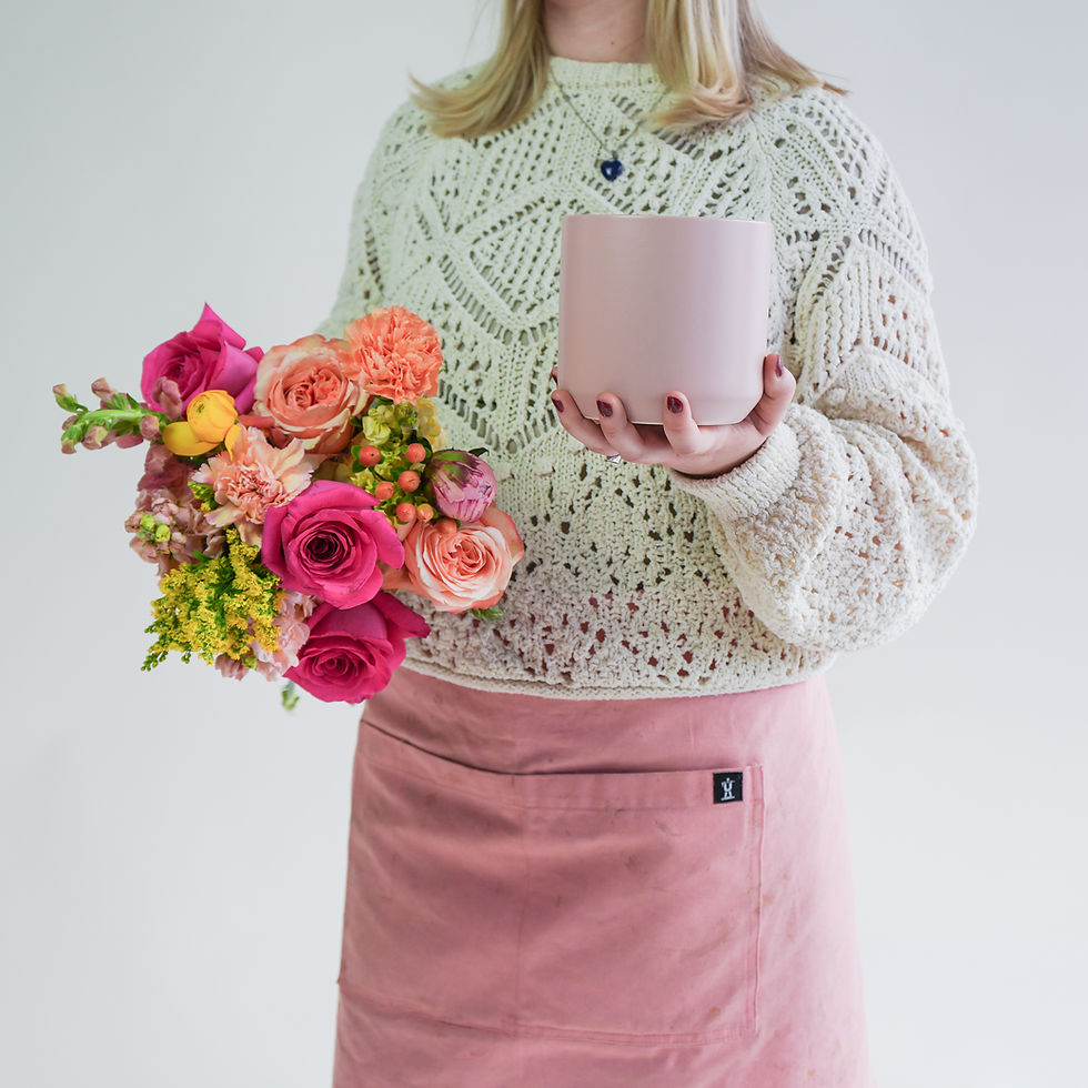 Thumbnail: person with pink and orange mixed bouquet