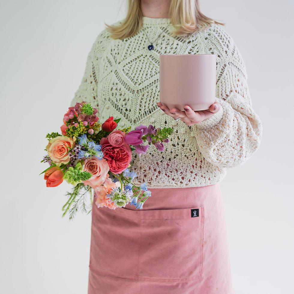 Thumbnail: person with larger colorful spring bouquet