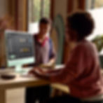 A lady using the Apple iMac All-in-One Desktop Computer with M4 chip (8-core CPU, 8-core GPU)