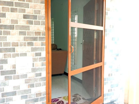 Window mosquito net installation for homes in Bhavani