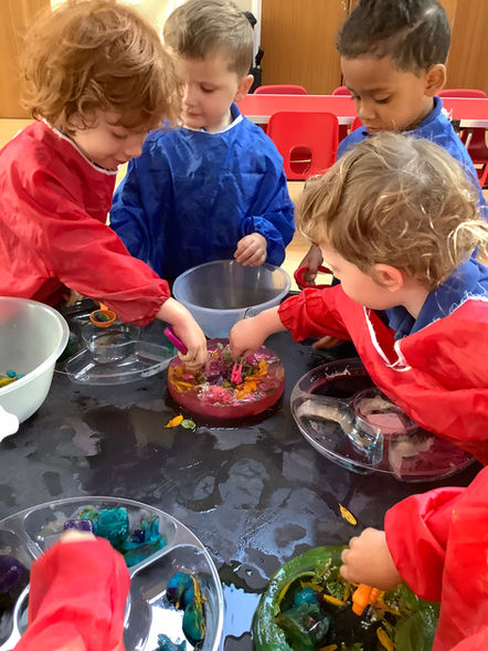 Toddlers playing with water