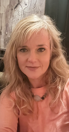 Your Coach Melissa - a headshot of her, female, long blond hair