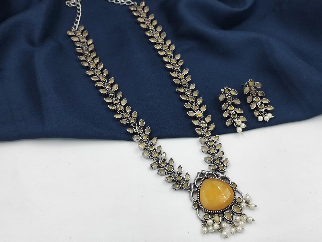 "Dvasu Radiant Gemstone Cascade Set"