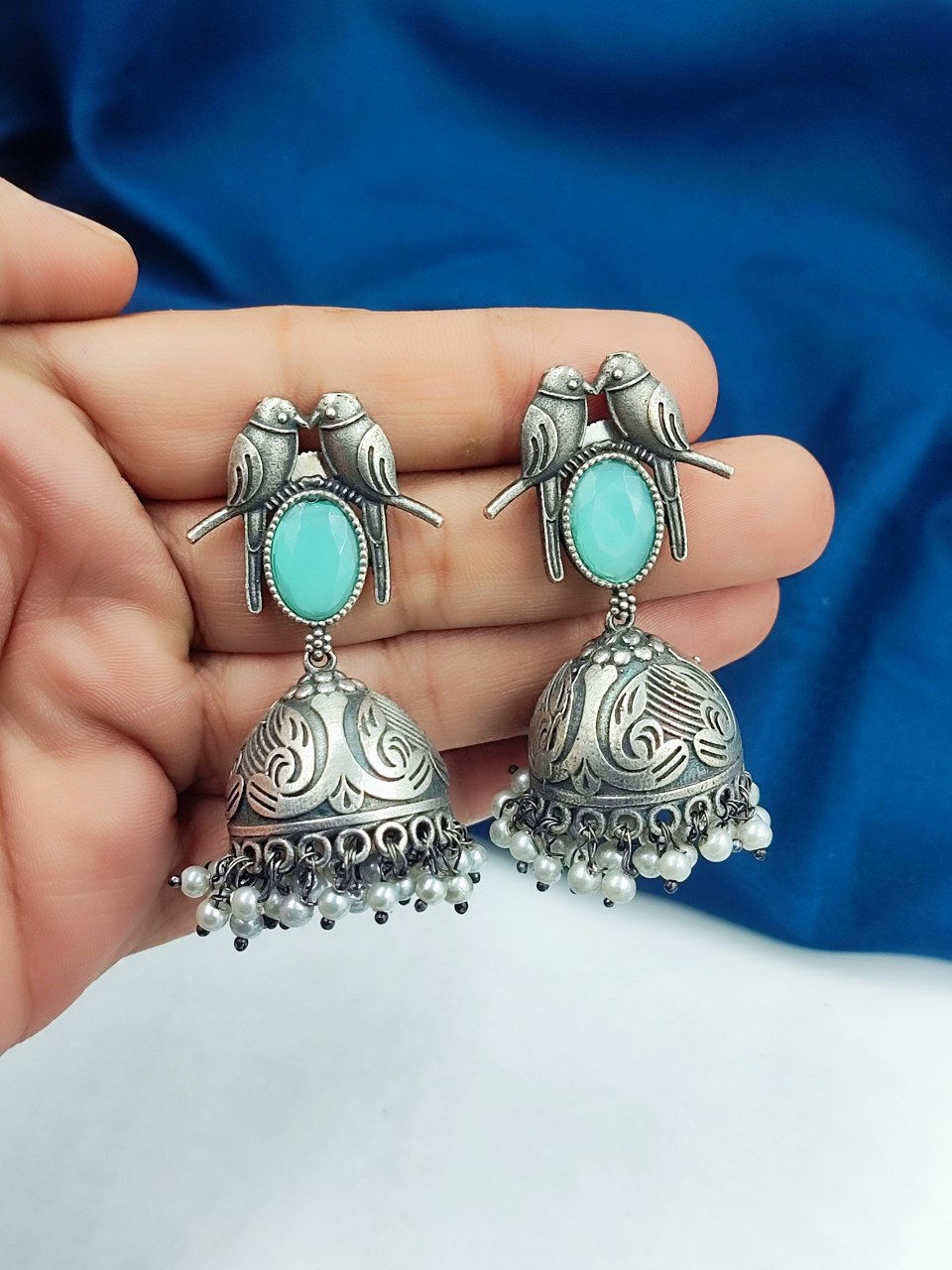 Dvasu Oxidised Feathered Finesse Jhumka Earrings