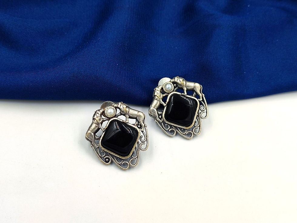 Thumbnail: Dvasu's Oxidised Monalisa Lion Gaze Earrings