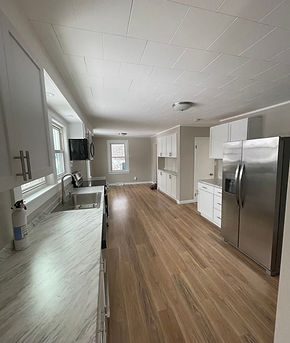 the after picture of a house that home buyers ne flipped