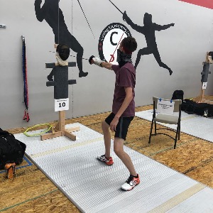 CEFC Fencer training on a target during the COVID-19 Pandemic