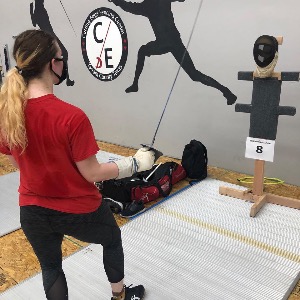 CEFC Fencer training on a target during the COVID-19 Pandemic