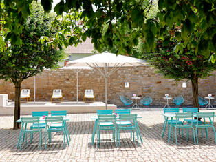 INNER COURTYARD WITH SUN DECK AND LOUNGE AREA