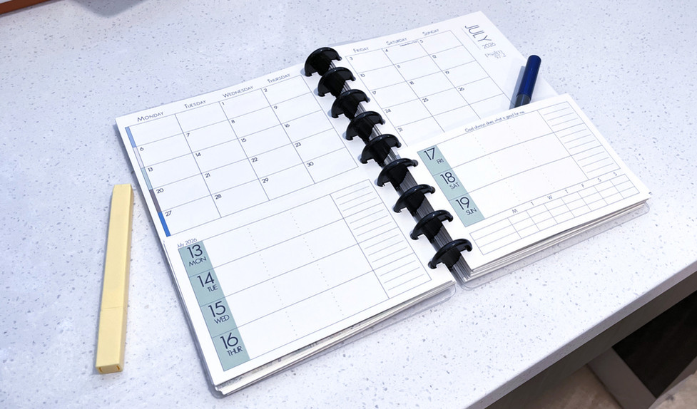 Weeks are half-sized with the month visible behind them.