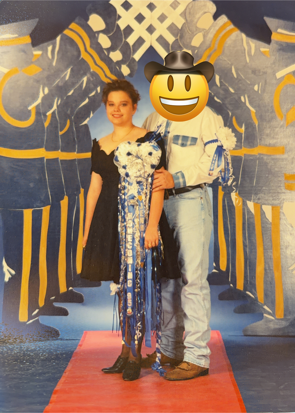 Two people with a homecoming mum