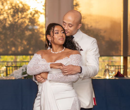 Bride and groom dancing at wedding reception