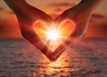 sunset-in-heart-hands.jpg