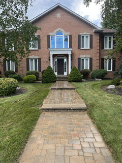 Interlock walkway after sealing in Oakville Ontario with restored colour stabilized joints and protective seal finish