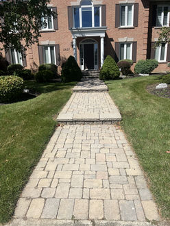 Interlock walkway before sealing in Oakville Ontario showing faded pavers worn joints and dull surface prior to restoration