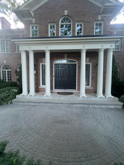 Interlock front entrance after polymeric sanding in Oakville Ontario with joints refilled stabilized and clean uniform paver finish