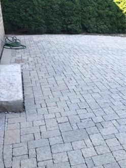Interlock patio after re leveling in Oakville Ontario with improved surface alignment restored joints and cleaner uniform finish