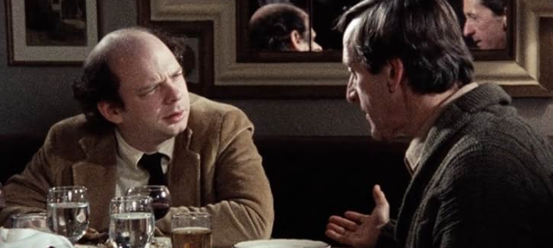 Wallace Shawn reacts as he listens to Andre Gregory during the film’s long and intense conversation. Image courtesy of IMDb.com.