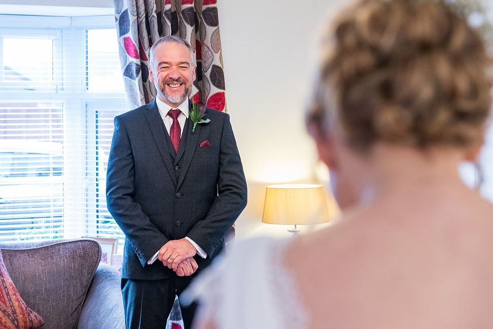 wedding dads first view of the bride