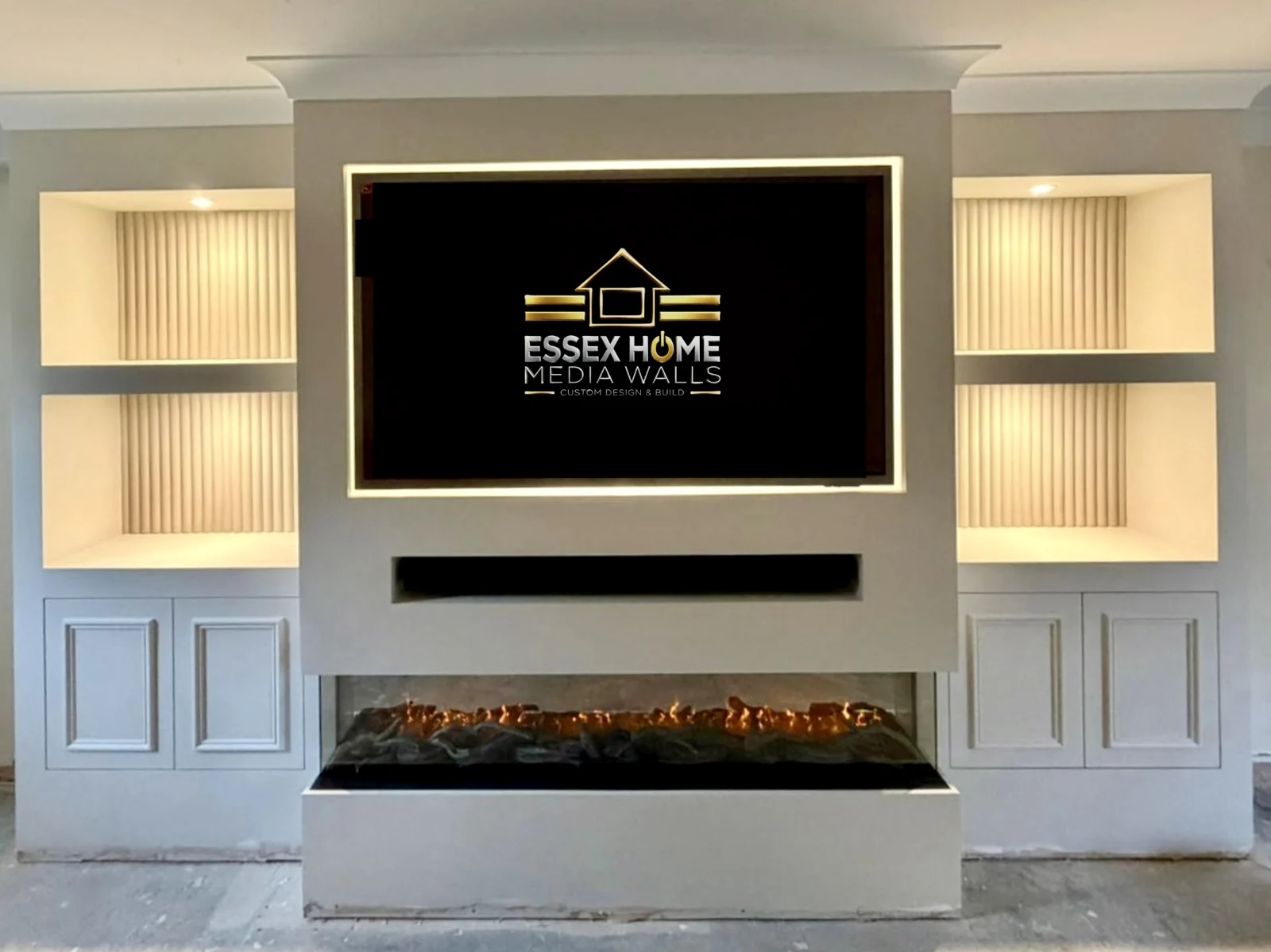 Media wall with lit ribbed niches, low cupboards and an electric fire