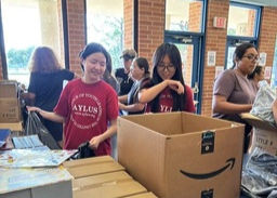 City and Neighbor Support: Volunteers Support Operation Backpack Alvin ISD on July 21, 2025