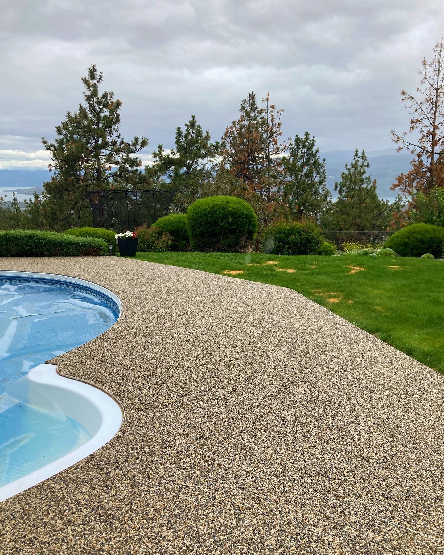 Stone aggregate surfacing beside a pool, from Sierra Stone’s project gallery — Stone aggregate surfacing beside a pool, from Sierra Stone’s project gallery. Photo: Sierra Stone South & Central Okanagan Ltd.
