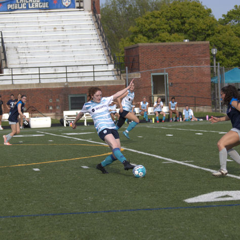 Katharine Stephens kicks the ball up field (Photo: Jacob Darner)