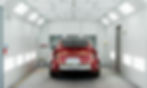 EV vehicle inside the paint booth ready to be paint