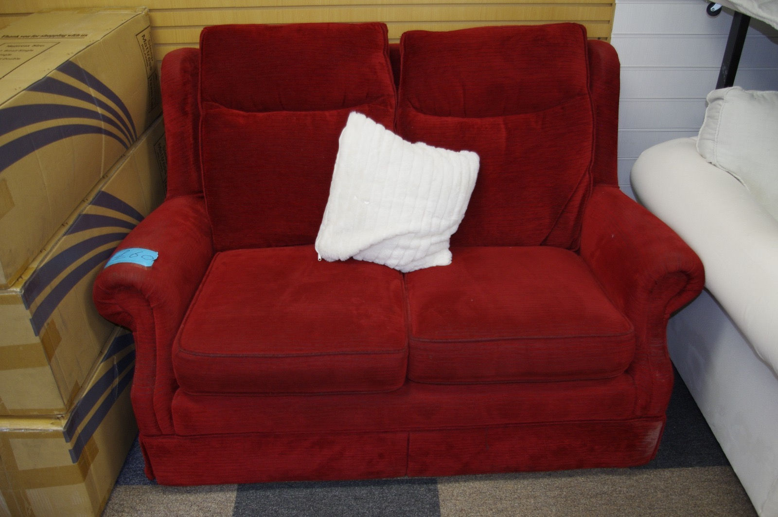 Red Two-Seater Sofa – With Fire Safety Label