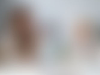 Woman doing speech therapy with a little blonde boy