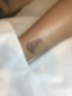 Fine-line tattoo
