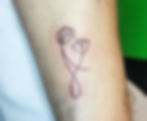 Fine-Line Tattoo