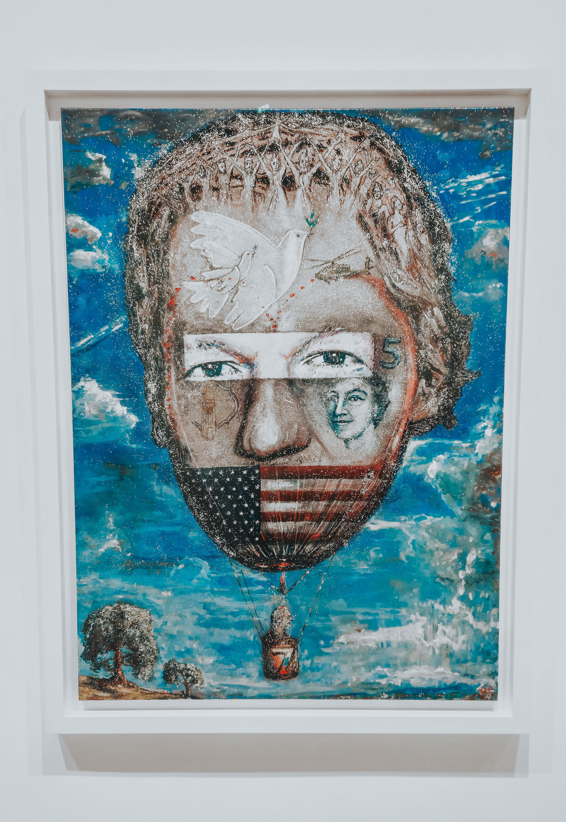 A spangled symbolist portrait of Julian Assange floating in reflection by Shaun Gladwell