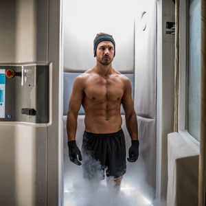 Cryo chamber therapy session showing cold vapor inside the chamber